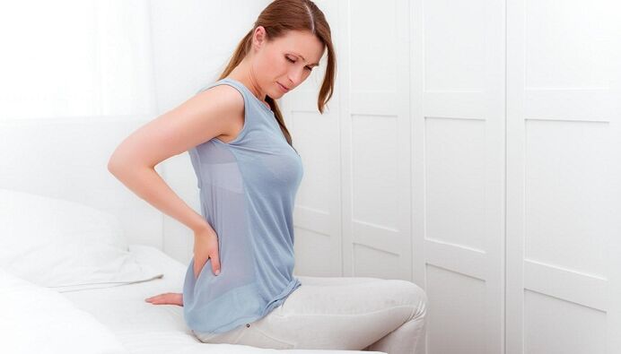 Woman worried about back pain